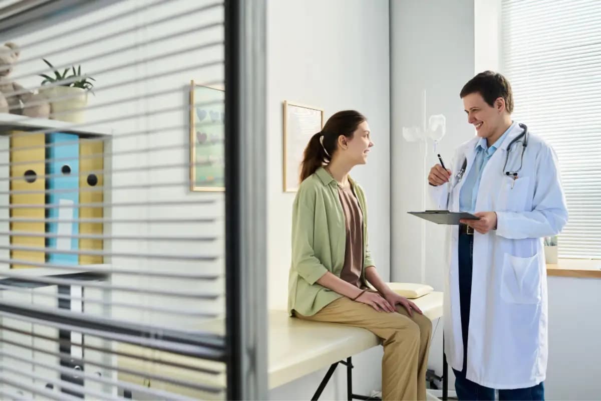 Doctor consulting with a patient in a private clinic