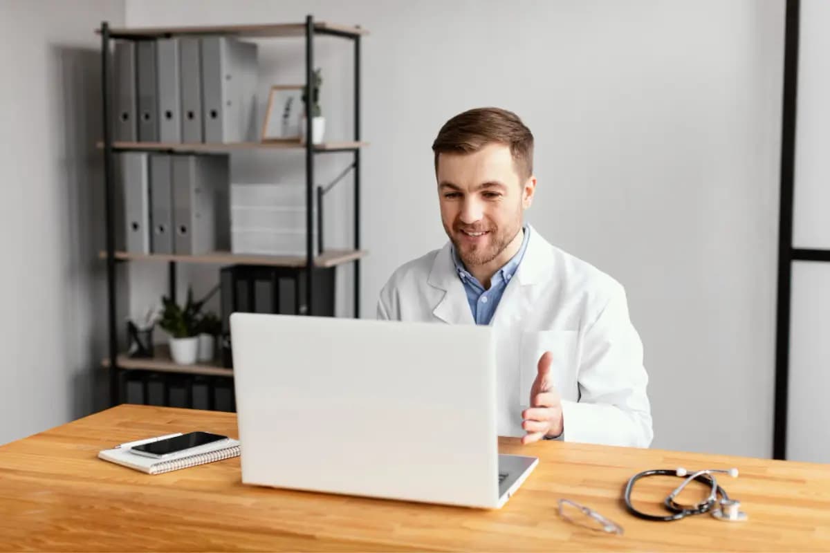 Solo doctor smiling during a telehealth consultation